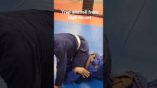 Trap and roll escape from high mount. bjj