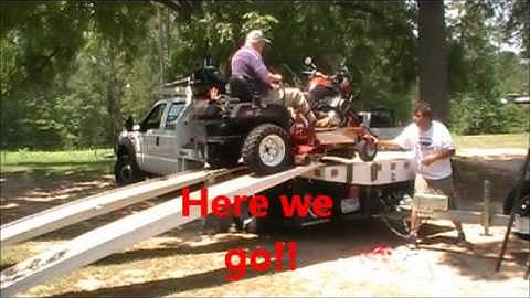 Unloading accident. Karl backflips a 60" zero turn off a trailer.