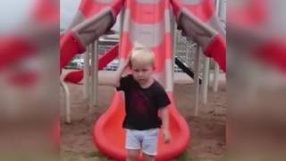 Kid Hits His Head Multiple Times While Sliding Down