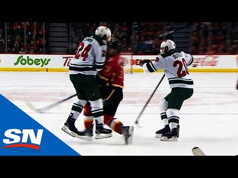 Matt Dumba Takes Out Mikael Backlund With Massive Open Ice Hit To End Game