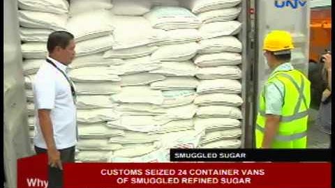 Customs seized 24 container vans of smuggled refined sugar
