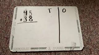 Adding two digit equations using a place value drawing