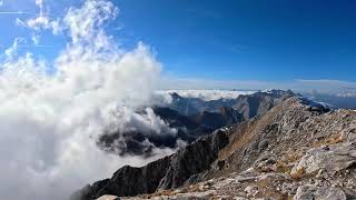 Clouds dispercing when reching mountain peaks