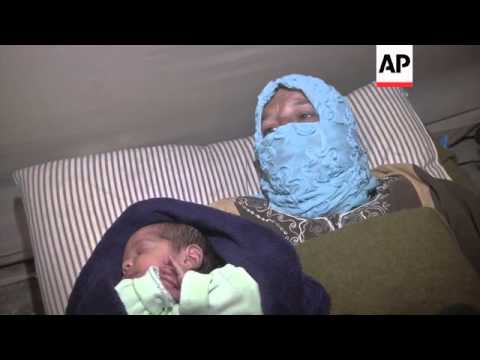 syrian-women-gives-birth-in-refugee-camp-after-fleeing-her-war-torn-country