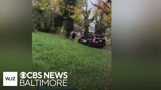 Baltimore officer suspended without pay after video shows him chasing person with patrol car