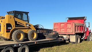 ￼ Operating the 236B cat skid steer with the Land Honor￼ motor grader attachment. ￼