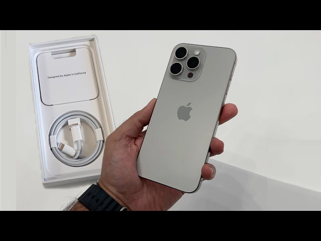 Unboxing iPhone 15 Pro Max box in Natural Titanium color - (Mention  @zana_qaradaghy on Instagram while use this photo) Follow on Instagram  @zana_qaradaghy · Free Stock Photo