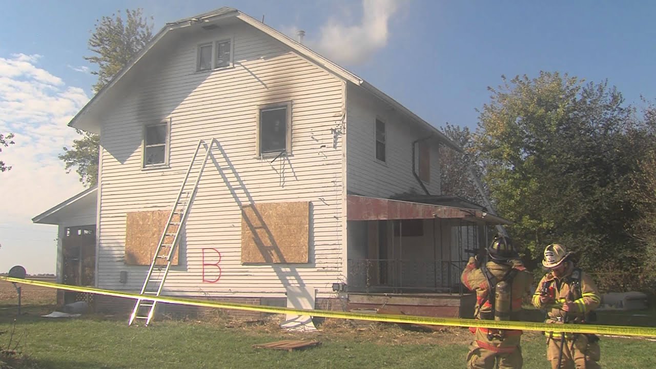 Elise Menaker inside a burning house during Clinton, IL fire training