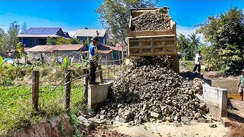 Incredible Create New dam using pure stone Pushing By Bulldozer & Team Trucks 5Ton Unloading Stone.