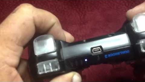 Black dualshock 3 with all clear buttons and purple uv leds