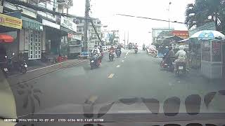 Motorbikes Weaving Through Traffic Without Regard for Safety