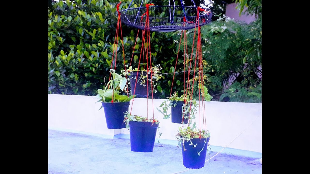 How to make a simple hanging planter using old fan cover.