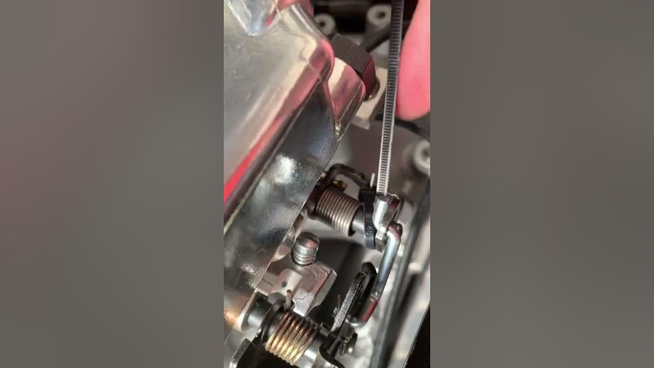 How to add a wind to the secondary throttle shaft return spring on the