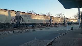 Northbound CSX empty grain train on track one; so much for PSR; two NB on separate tracks in 12 min.
