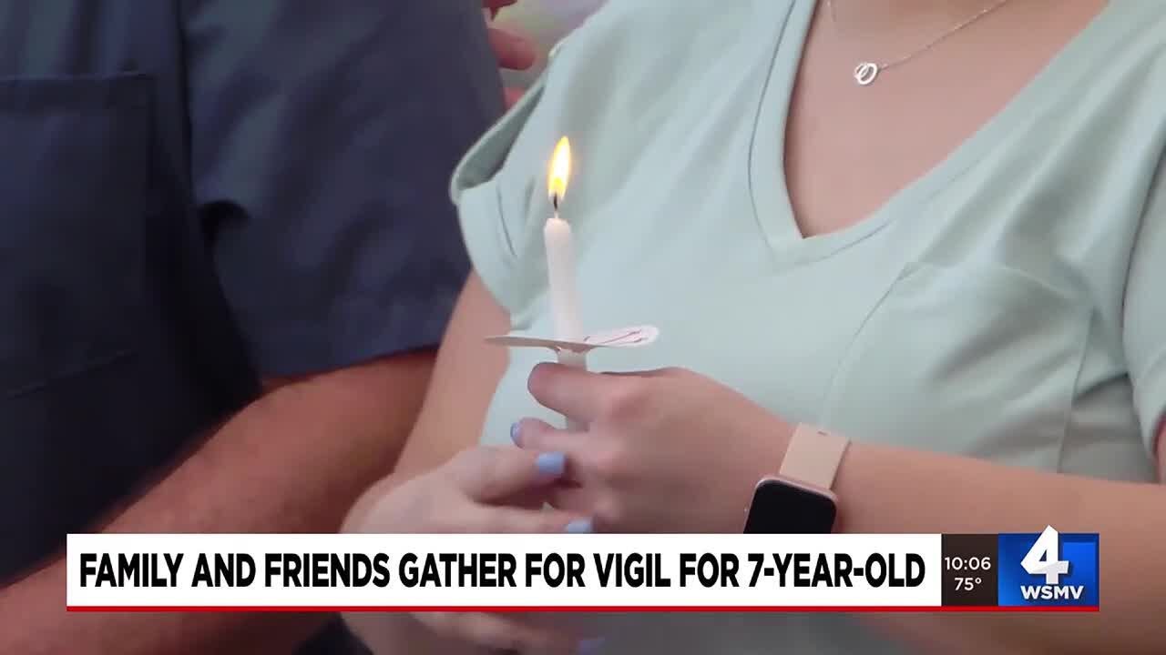 Family and friends gather for vigil for 7-year-old - YouTube