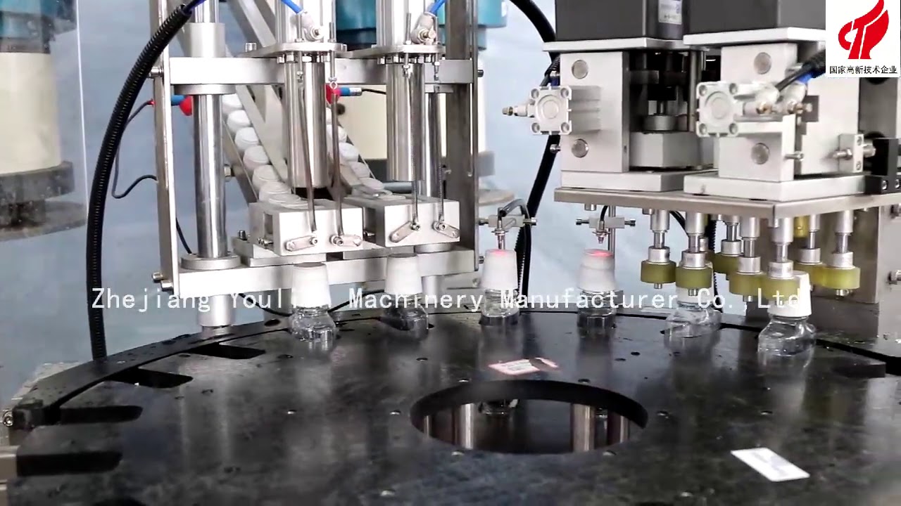 Double heads capping machine for 250ml mouthwash bottle - YouTube