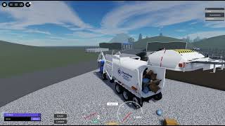 Shoreline Services Autocar ACX Amrep HX-450 Front Loader unloading at the transfer center