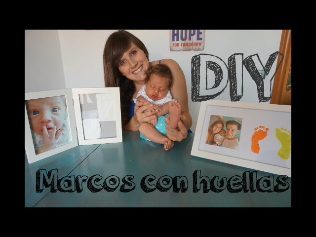 Marco de fotos y huellas de bebé