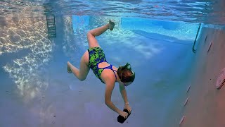 Diving Brick in the Deep End of a very cold swimming pool