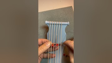 How to add 6mm 2-hole beads to your warp threads
