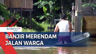Banjir Merendam Jalan Warga