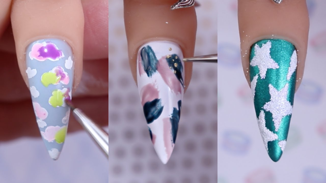 Creative stiletto nail design on a woman's hand on Craiyon
