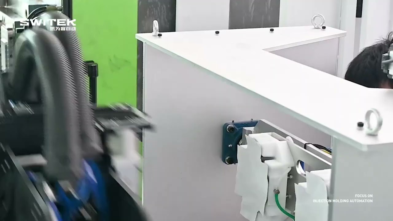 Switek Automation - 2 Cavities Box Turn-key IML Solution