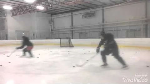 Pro hockey player Tim Recio skating and puck control