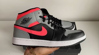 jordan 1 mid black hot punch