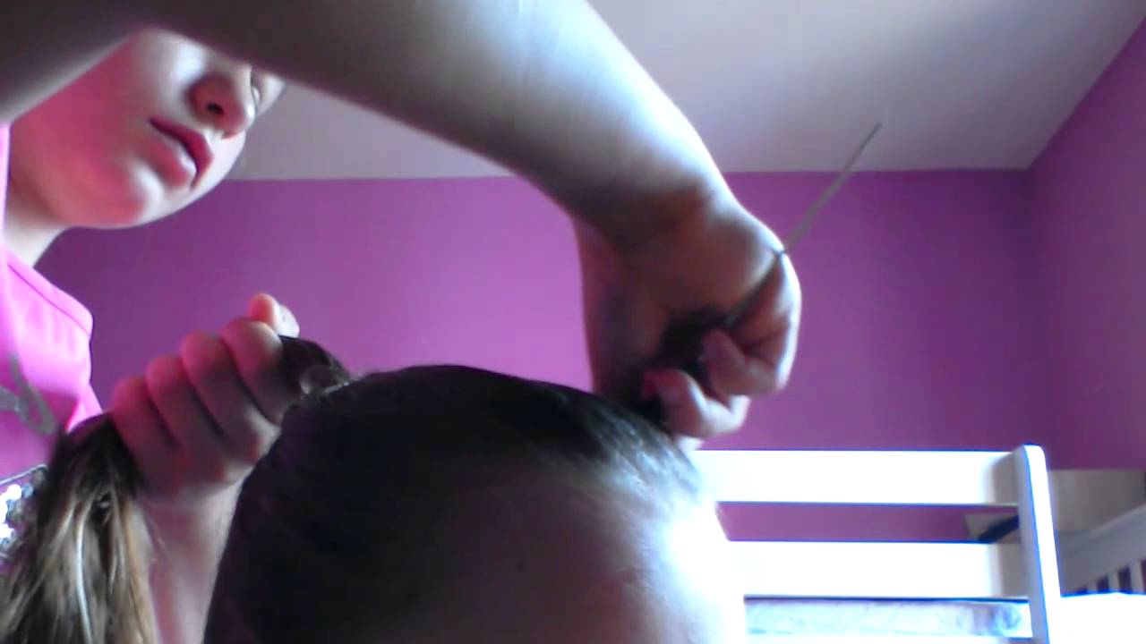 My friend doing my hair