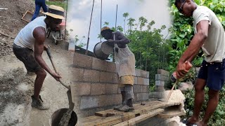 the rain won't stop but the work must continue blocking up to lintel