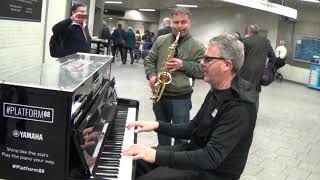 Dude With A Sax Turns Up Next To The Piano