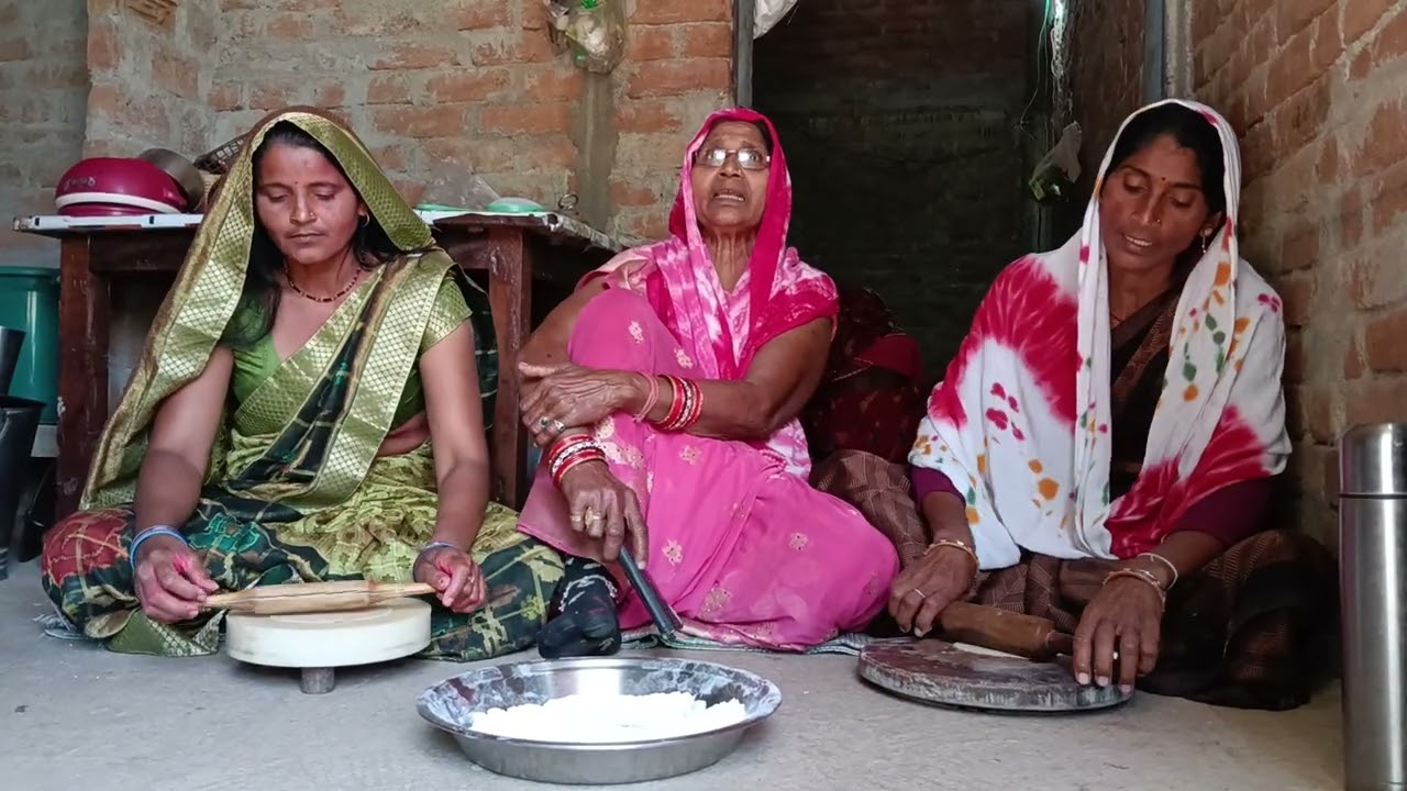 पूड़ी बेलनहाई गीत 