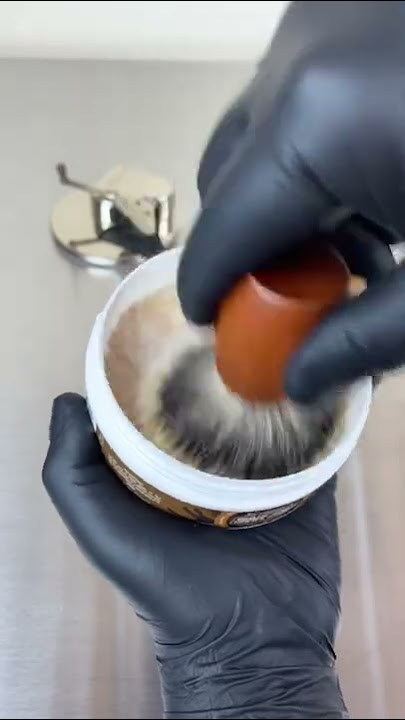 Lathering up some shaving soap for a smooth comfortable shave