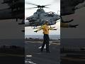 USMC AH-1Z Super Cobra attack helicopter on an amphibious assault ship.