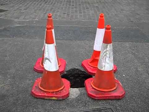 newspaper mockup Huge pothole opens in Aberdeen road