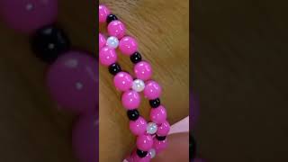 Pulseira entrelaçada rosa e preto