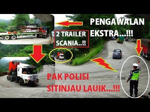 2 TRAILER DIKAWAL POLOSI MELEWATI JALUR EKSTRIM SITINJAU LAUIK