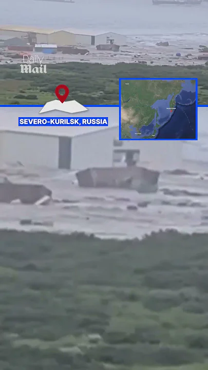 Moment tsunami hits Russian shoreline, destroying homes and sweeping buildings into the sea