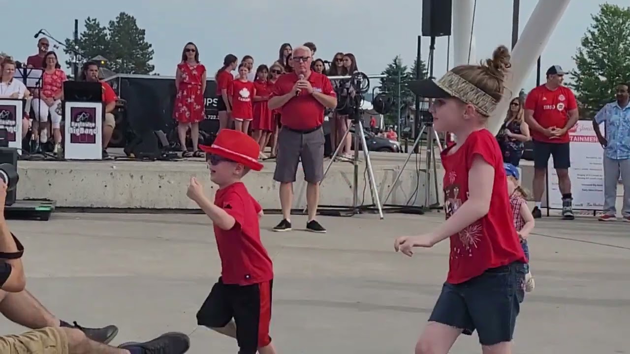 Singing of O Canada on Canada Day at Meridian Place Barrie On.