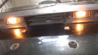 License plate light bulb replacement (2001-2007 Ford Escape)