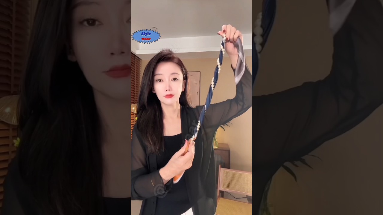 Wrap scarf and pearl necklace around your neck