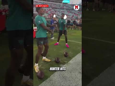 Travis hunter hits the dougie before kickoff