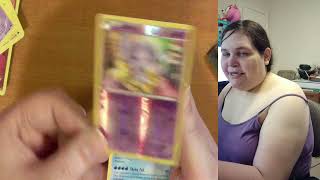 The T.C. opens a 14 Pokemon card packs shes been saving since 2019