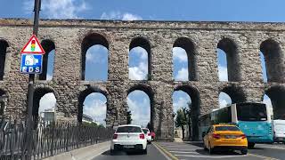 Driving Through Istanbul's Iconic Valens Aqueduct on a Beautiful Day