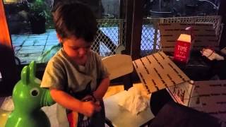 Noah opening Christmas box