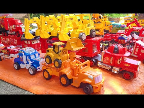 tìm xe đồ chơi , xe container chở ôtô máy múc , xe cần cẩu , xe tải , xe bồn, xe cứu hỏa, máy xúc