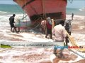 stuck boat Kazhakuttom will left