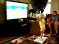 The kids playing wii fit