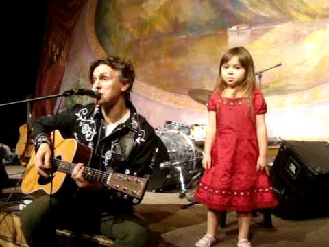 Starla dances on stage with Uncle Rock during "Leave the Bees Be" at Kidtopia!